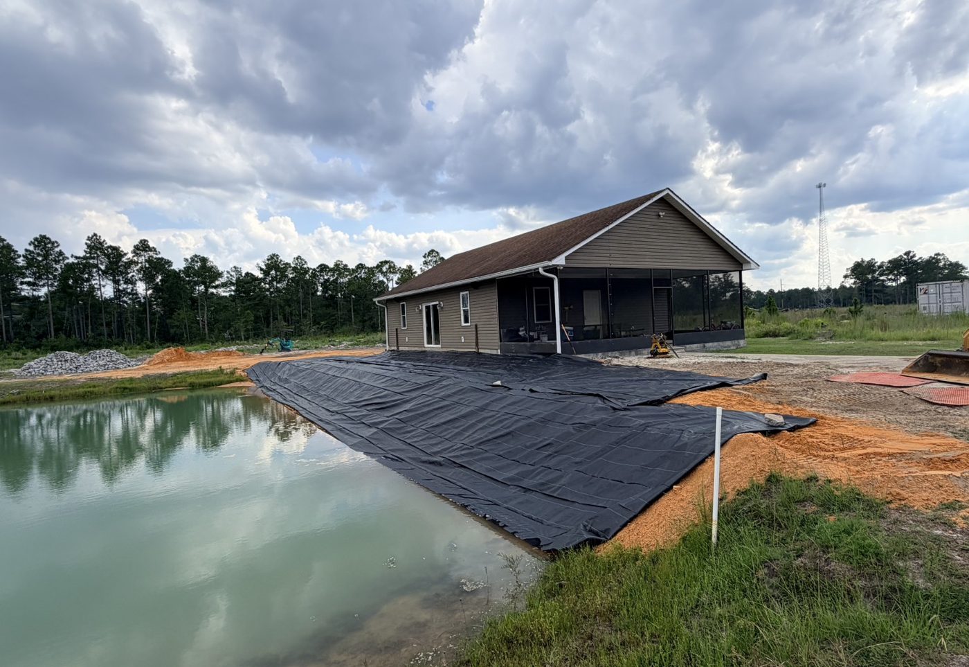 Shoreline stabilization and erosion control fabric on a Southeast Georgia pond project